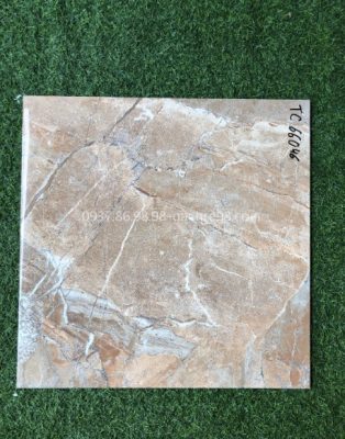 Gạch lát nền bóng kiếng 60x60 vân đá màu vàng